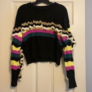 Cute sweater with ruffles size large.
